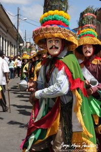 Photo of masked performer in feast of San Sebastián