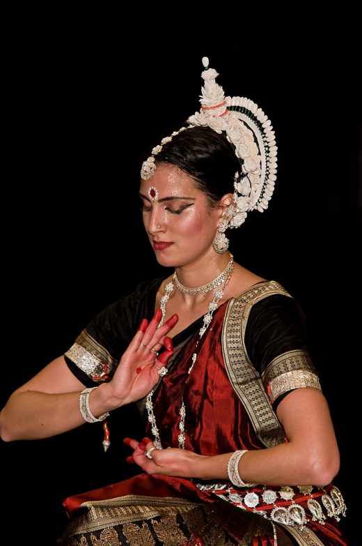 This a photo of a female creating a mudra in performance.